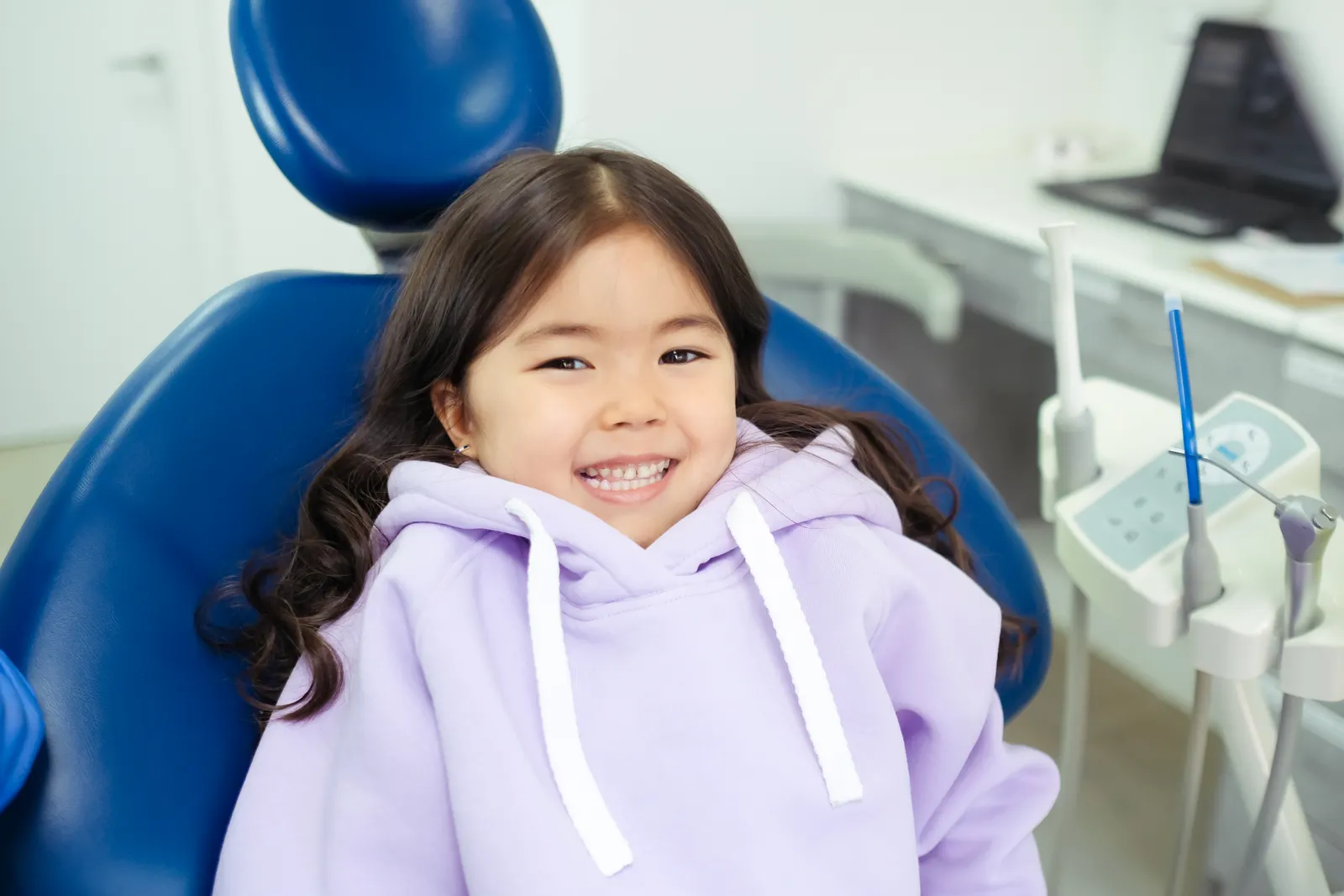 Smiling child in the dental chair